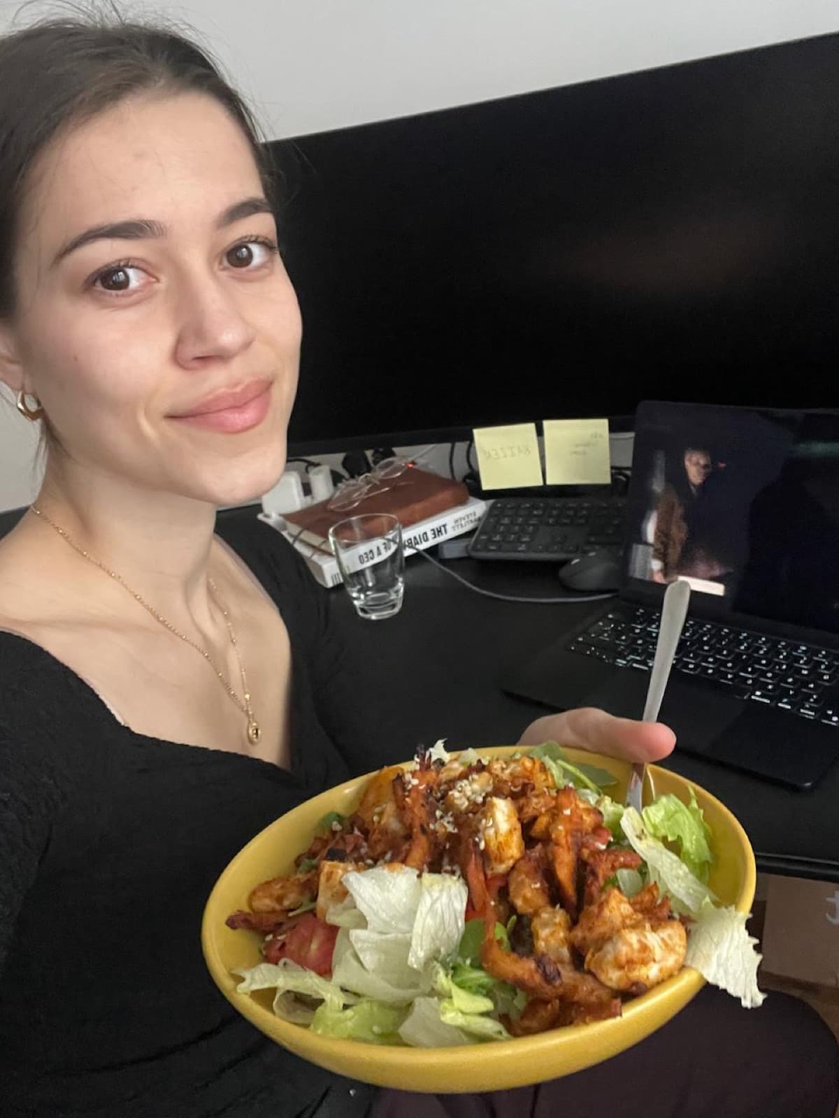 Vera holding a fresh salad bowl